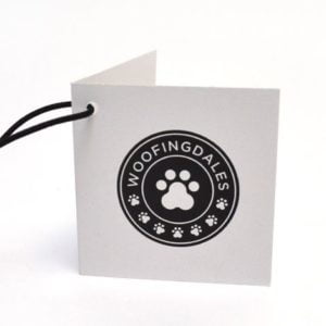 Uncoated tags with a raw, natural finish, ideal for eco-conscious branding and product labeling, featuring simple designs and robust eyelets for secure attachment, emphasizing an organic and authentic retail experience.